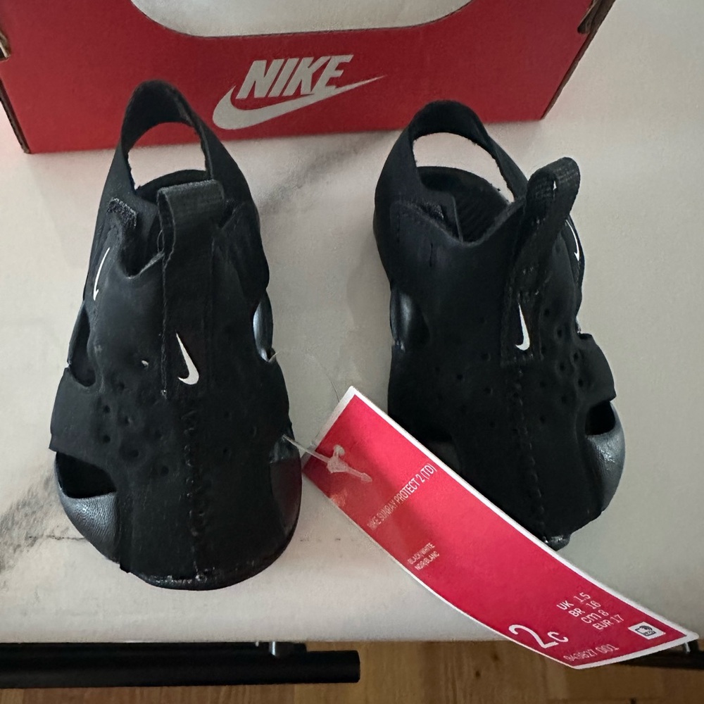 Toddler size 2c Nike sandals.